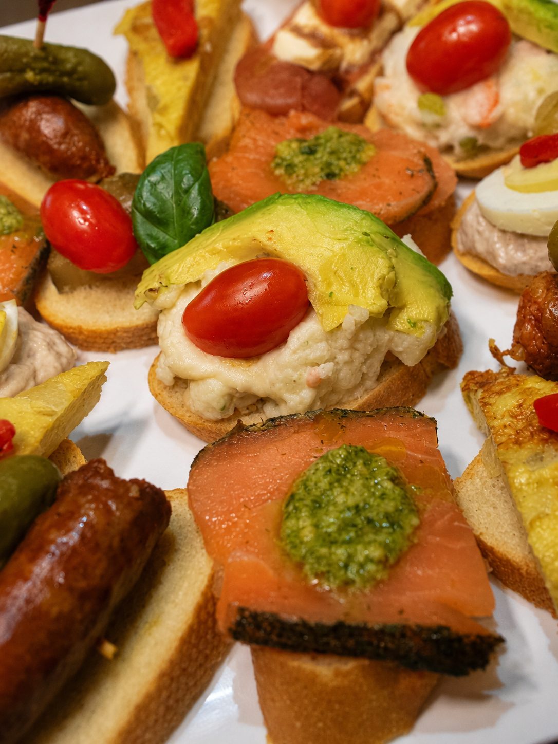 Assorted montados on toasted baguette, catering tray