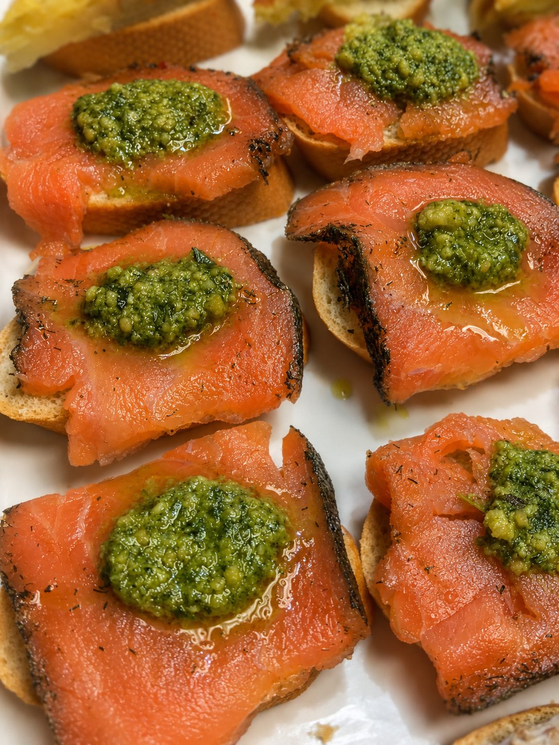 Salmon montado on toasted baguette — Renzo's catering